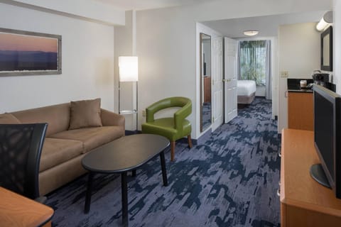 Suite, 1 Bedroom | Living room | 32-inch Smart TV with cable channels, TV, Netflix