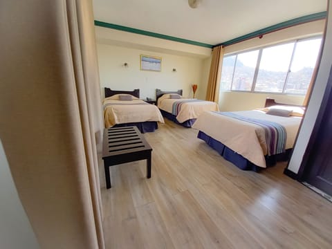 Deluxe Triple Room, 3 Twin Beds, City View | In-room safe, free WiFi, bed sheets