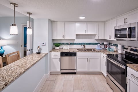 2 Bedroom Street View | Private kitchen | Full-size fridge, microwave, oven, stovetop