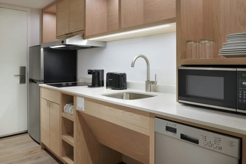 Studio, 1 King Bed, City View | Private kitchen | Coffee/tea maker, eco-friendly cleaning products