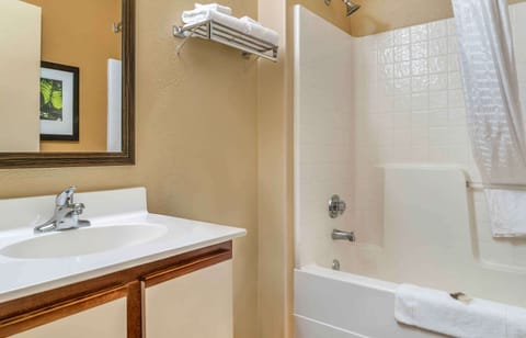 Studio, 1 Queen Bed, Non Smoking | Bathroom | Combined shower/tub, free toiletries, hair dryer, towels