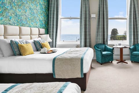 Family Room, Sea View | In-room safe, iron/ironing board, free WiFi, bed sheets