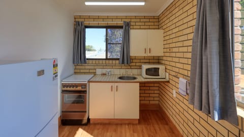 Apartment, Multiple Bedrooms, Non Smoking | Private kitchen | Fridge, microwave, cleaning supplies