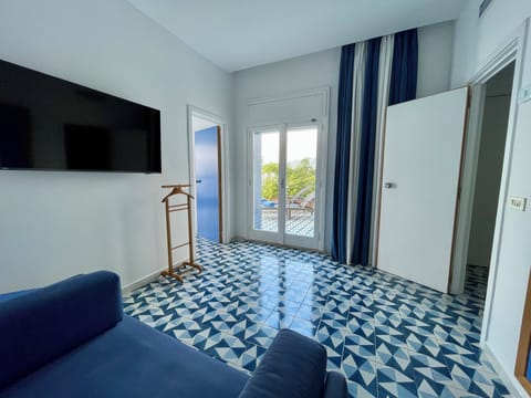 Junior Suite, Balcony, Sea View | Hypo-allergenic bedding, minibar, in-room safe, desk