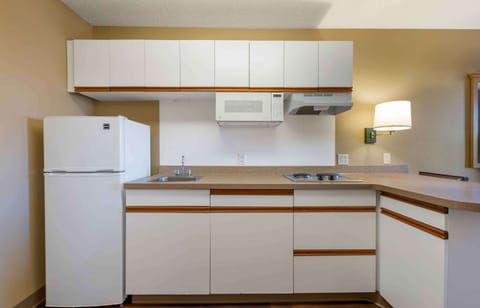 Studio, 1 Queen Bed, Non Smoking | Private kitchen | Full-size fridge, microwave, stovetop, coffee/tea maker