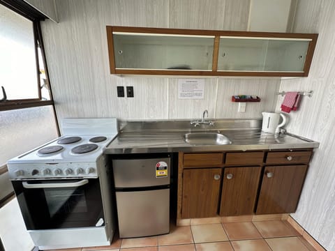 Deluxe Studio | Private kitchen | Mini-fridge, microwave, coffee/tea maker, electric kettle