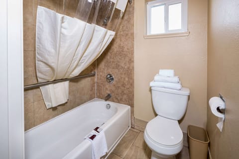 Combined shower/tub, deep soaking tub, free toiletries, hair dryer