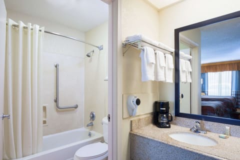 Combined shower/tub, hair dryer, towels, soap