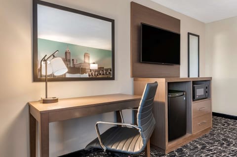 Suite, Multiple Beds, Non Smoking | Desk, laptop workspace, blackout drapes, iron/ironing board