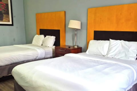 Room, 2 Queen Beds, Non Smoking | Desk, iron/ironing board, free WiFi, alarm clocks