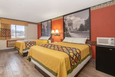 Desk, laptop workspace, blackout drapes, iron/ironing board