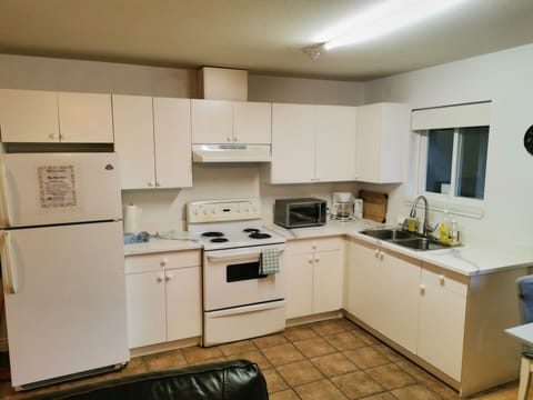 Family Suite, Multiple Bedrooms | Private kitchen | Microwave, toaster, freezer