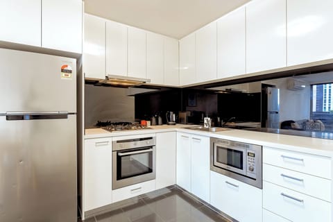 Exclusive Apartment | Private kitchenette | Full-size fridge, microwave, oven, stovetop