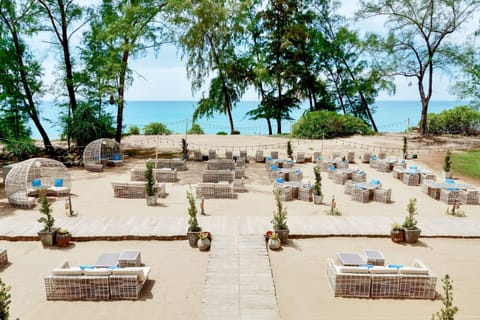 On the beach, sun loungers, beach umbrellas, beach towels