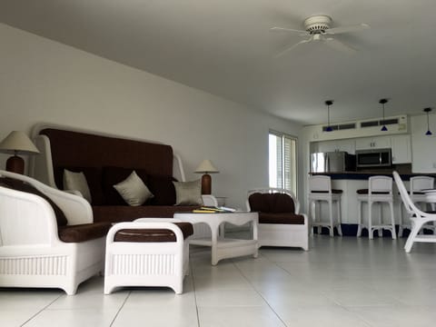 Deluxe Suite, 1 Bedroom, Ocean View | Living area | TV, DVD player