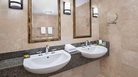 Suite, 1 King Bed, Non Smoking | Bathroom | Free toiletries, hair dryer, towels, soap