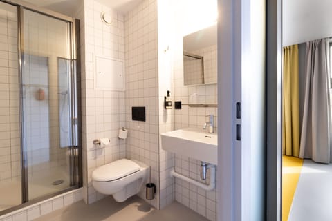 Basic Double Room | Bathroom | Shower, hair dryer, soap, shampoo