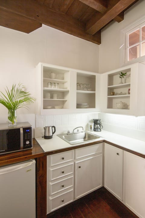 Contemporary Suite | Private kitchen | Mini-fridge, coffee/tea maker, electric kettle