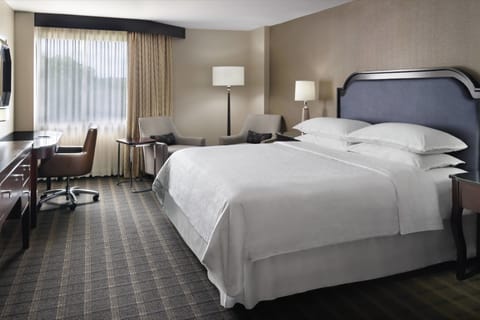 Premium bedding, down comforters, pillowtop beds, in-room safe