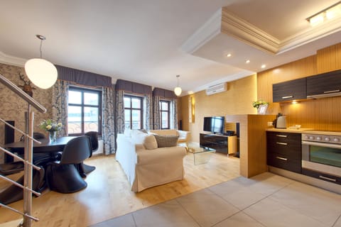 Deluxe Apartment, 2 Bedrooms | Living room | 42-inch LCD TV with satellite channels, TV