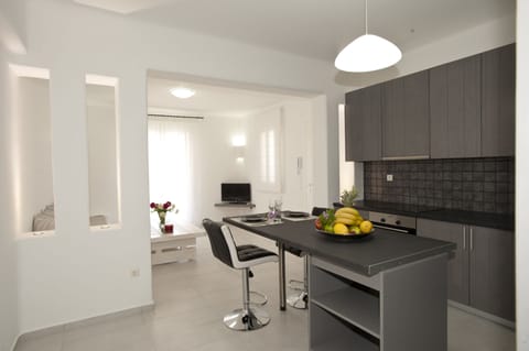 Apartment, 2 Bedrooms | Private kitchen | Fridge, stovetop, coffee/tea maker, electric kettle