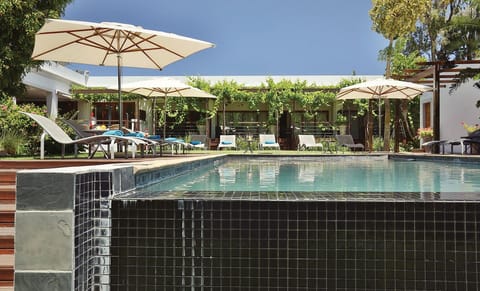 Outdoor pool, pool umbrellas, sun loungers