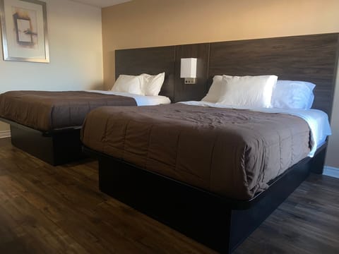 Room, 2 Queen Beds, Non Smoking | Desk, iron/ironing board, free cribs/infant beds, rollaway beds