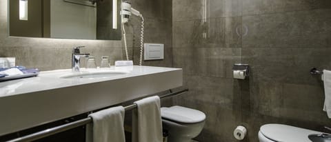 Combined shower/tub, eco-friendly toiletries, hair dryer, bathrobes