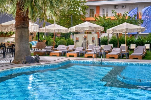 Outdoor pool, open 9:00 AM to 8:30 PM, pool umbrellas, sun loungers