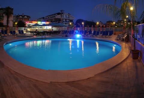 Seasonal outdoor pool, pool umbrellas, sun loungers