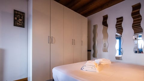 Classic Studio (0 Bedroom) | Laptop workspace, iron/ironing board, bed sheets