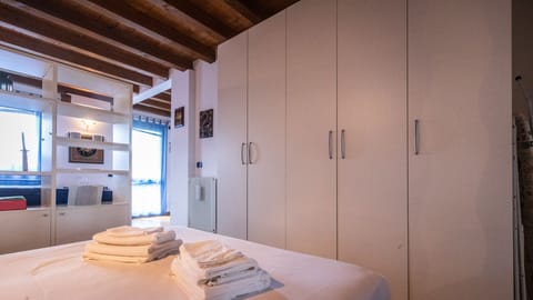 Classic Studio (0 Bedroom) | Laptop workspace, iron/ironing board, bed sheets