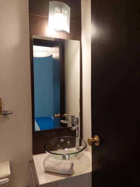 Economy Room | Bathroom | Shower, free toiletries, hair dryer, towels