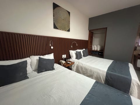 Deluxe Room, 2 Double Beds | Down comforters, memory foam beds, desk, laptop workspace