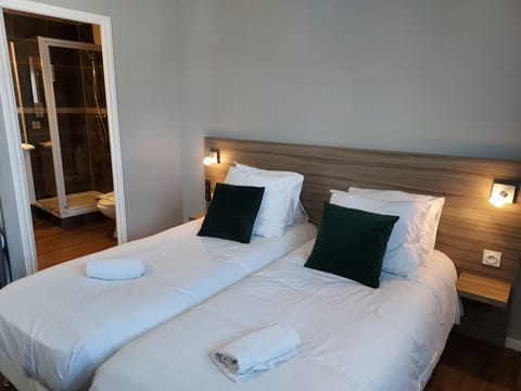 Quadruple Room, 1 Bedroom, Non Smoking, Balcony | Premium bedding, desk, iron/ironing board, free WiFi