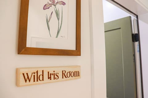 Wild Iris Room | Premium bedding, blackout drapes, soundproofing, iron/ironing board