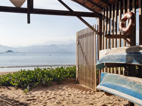 On the beach, free beach cabanas, beach umbrellas