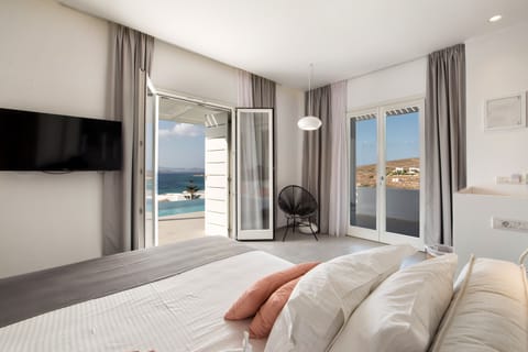 Executive Suite, Private Pool, Sea View | Premium bedding, minibar, in-room safe, individually decorated