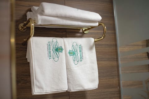 Royal Studio | Bathroom | Rainfall showerhead, free toiletries, hair dryer, bathrobes