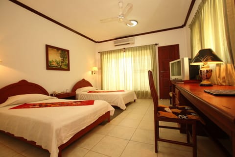 Standard Twin Room | Minibar, in-room safe, rollaway beds, free WiFi