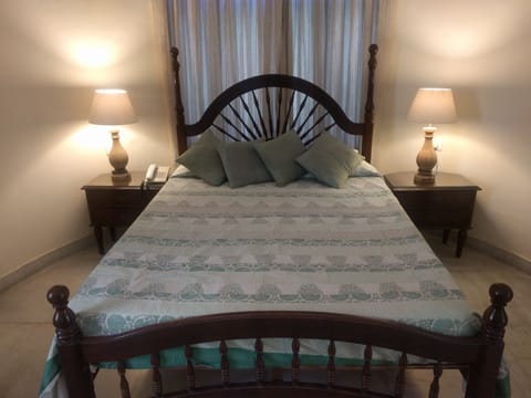 Standard Double Room (with AC) | Minibar, in-room safe, desk, iron/ironing board