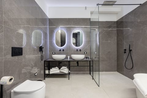 Exclusive Apartment | Bathroom | Shower, rainfall showerhead, free toiletries, hair dryer