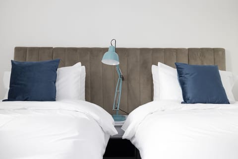 Apartment, 3 Bedrooms | 3 bedrooms, desk, laptop workspace, iron/ironing board