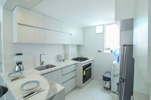 Comfort Apartment | Private kitchen | Full-size fridge, oven, stovetop, dishwasher