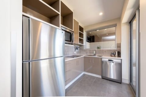 Deluxe Apartment, 1 Bedroom | Private kitchen | Full-size fridge, microwave, stovetop, dishwasher