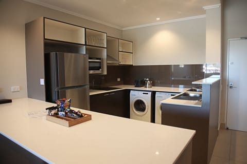 Deluxe Apartment, 2 Bedrooms, Accessible, City View | Private kitchen | Full-size fridge, microwave, stovetop, dishwasher