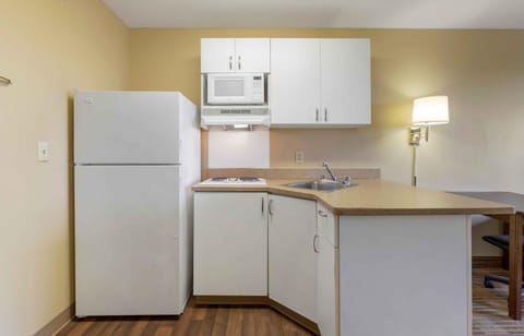 Studio, 1 Queen Bed, Non Smoking | Private kitchen | Full-size fridge, microwave, stovetop, coffee/tea maker