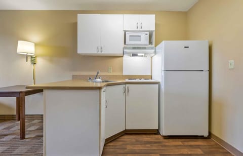 Studio, 1 King Bed, Non Smoking | Private kitchen | Full-size fridge, microwave, stovetop, coffee/tea maker
