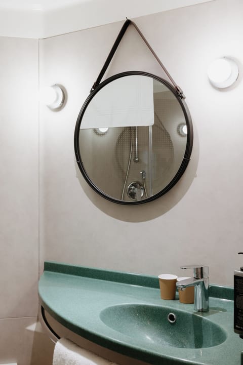 Shower, eco-friendly toiletries, hair dryer, towels