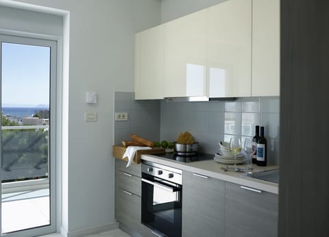 Executive Penthouse, 2 Bedrooms, Sea View | Private kitchen | Full-size fridge, espresso maker, coffee/tea maker, electric kettle